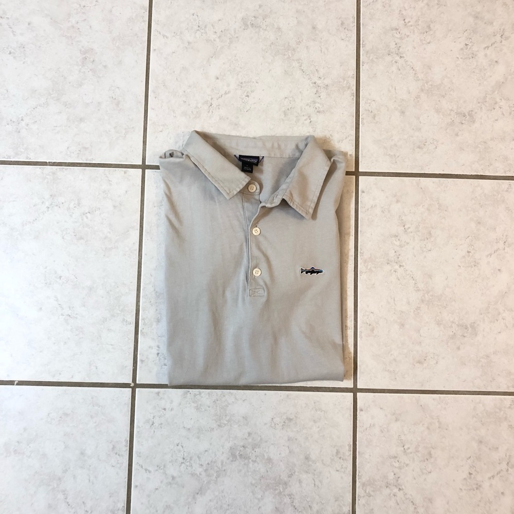 light grey shirt-sleeved patagonia polo